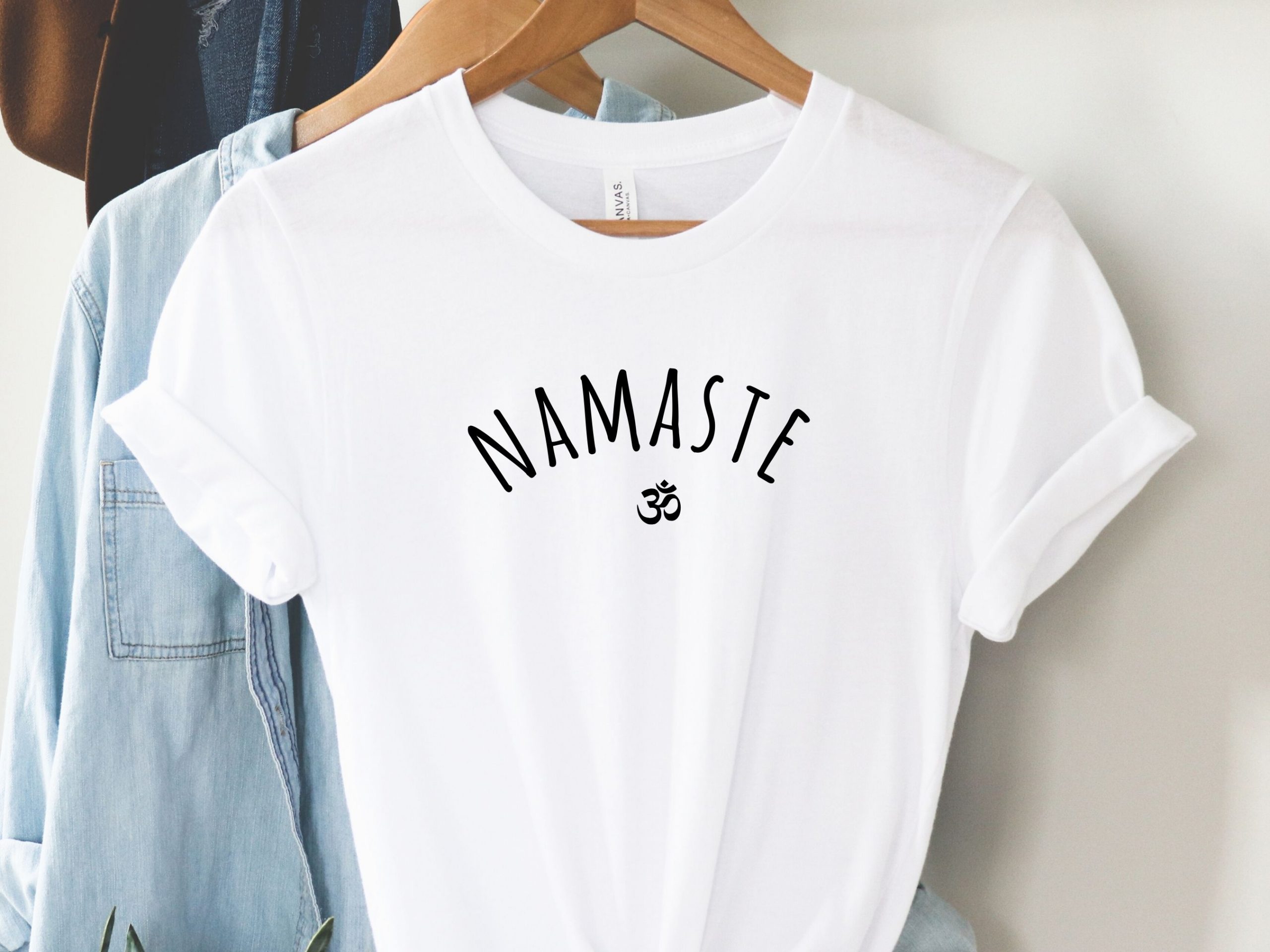 white tshirt with namaste print